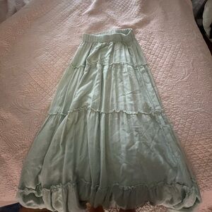 Francesca’s long green skirt
